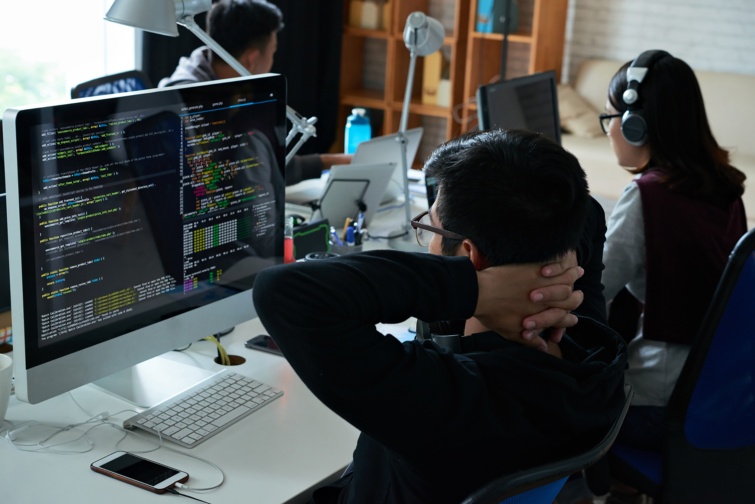 Pensive,Programmer,Looking,At,His,Code,On,Computer,Screen